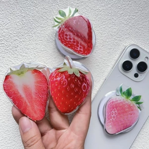 Magnetic acrylic strawberry phone grip sockets in various 3D fruit patterns and colors