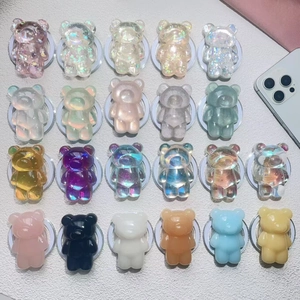 Collection of colorful 3D bear-shaped magnetic phone sockets and collapsible stands