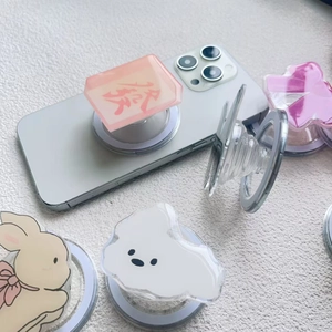 Variety of cartoon acrylic magnetic phone sockets featuring pink mahjong and bunny designs