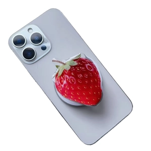 Magnetic acrylic strawberry phone grip stand with realistic 3D fruit texture on white base