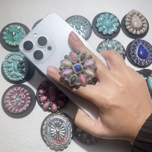 Retro bohemian phone socket grip with assorted vintage stone inlays in silver base