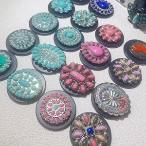 Detailed overhead view of assorted vintage bohemian style stone phone socket grips