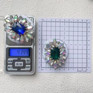 Macro detail of jeweled phone grip weight 41.44g and 5.5cm diameter measurement