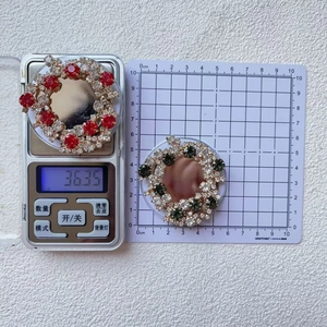 Detailed view of rhinestone ring weight measurement 36.35g and dimensions 6cm on scale