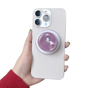 Detailed view of a purple marble texture phone grip holder on a white smartphone