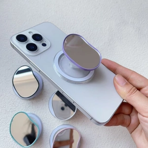 Magnetic MagSafe phone grip with retractable socket and oval makeup mirror in multiple colors