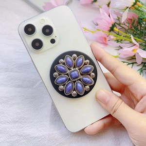 Detail of purple gem bohemian flower phone grip with vintage electroplated silver base