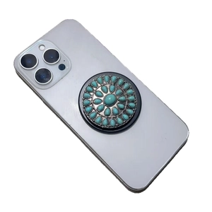 Retro bohemian phone socket stand with green turquoise stone and silver metal finish