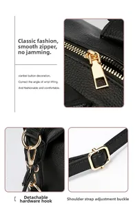 Detail of black pebbled leather tote featuring gold-tone zipper and adjustable strap hooks