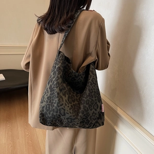 Large leopard print tote bag with thick canvas fabric and shoulder strap for women