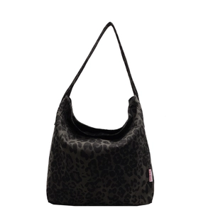 Minimalist large-capacity canvas tote bag with dark leopard print and shoulder straps