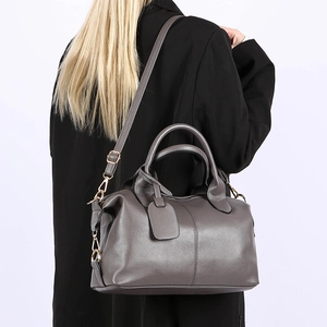 Minimalist grey lychee leather tote bag with top handles and adjustable strap