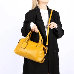 Yellow leather Boston handbag with textured finish and detachable shoulder strap