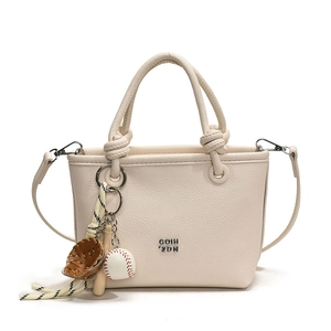 Vintage milk white lychee grain leather bucket bag with baseball themed charm