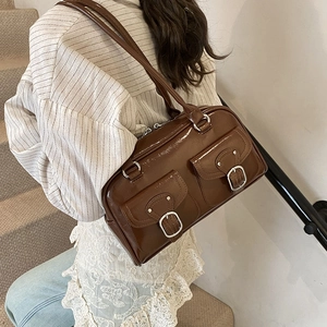 Brown faux leather large tote bag with dual front pockets and silver buckles