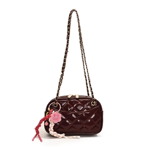 Deep wine red quilted patent leather crossbody camera bag with black and gold chain strap