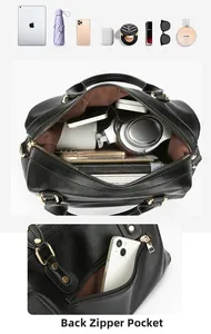 Detail of spacious interior with brown lining and practical back zipper pocket