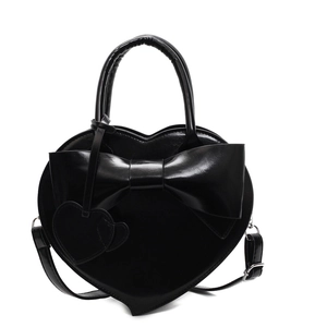 Sac à bandoulière noir en forme de cœur avec nœud décoratif et finition brillante