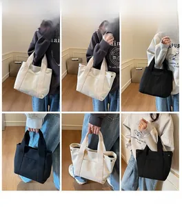 Detailed views of canvas tote bag showing handle, side metal buckles and front pocket