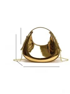 Detailed dimensions of the gold metallic crescent bag with handle and chain strap