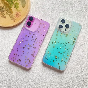 Detail view of iPhone 16 Pro Max cases with colorful gradient patterns and gold foil flakes