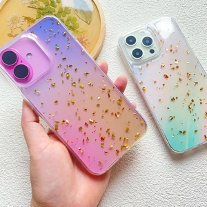 Close-up of gradient iPhone case with gold foil details and built-in lens protection