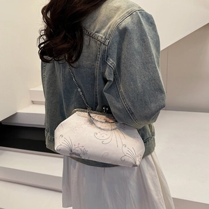 Elegant white fabric handbag with floral embroidery and silver chain strap for women