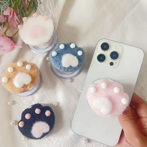 Cute plush cat paw phone grip stands in white, blue, brown, black and pink colors