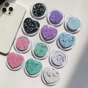 Glitter macaron phone sockets in heart and round shapes with magnetic suction feature