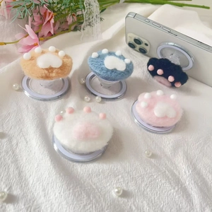Cute plush cat paw magnetic phone socket stand in five colors on a white background