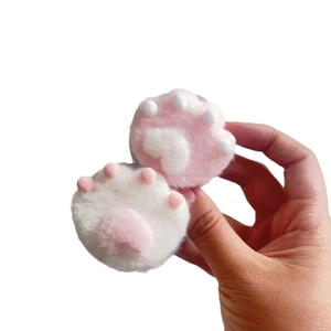 Plush cat paw magnetic phone socket in pink and white faux fur with a soft texture