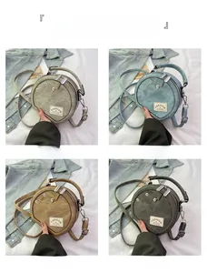 Four colors of round denim texture crossbody bags including light gray and denim blue