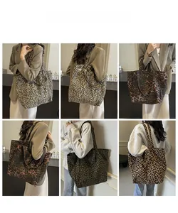 Detail shots of leopard print canvas tote bags in multiple colors with shoulder straps