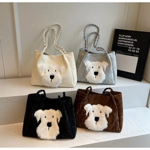 Detail of four colorful tote bags with 3D puppy heads and textured pleated fabric handles