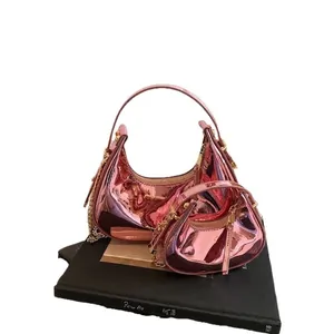 Pink metallic patent leather crescent underarm bag set with golden chain strap