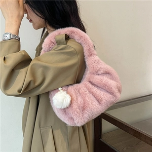 Chic pink plush dumpling shoulder bag with white fluffy pompom for women's autumn fashion