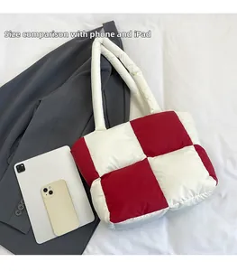 Large puffer tote bag in red and white check showing iPad size comparison detail