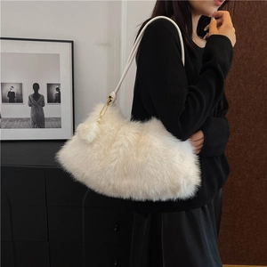 White faux fur shoulder bag with soft plush texture and elegant pearl charm detail