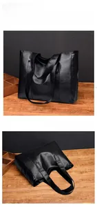 Macro detail of black nappa texture PU leather tote bag with spacious interior view