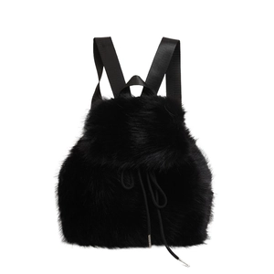 Minimalist black plush backpack with drawstring closure and soft faux fur texture
