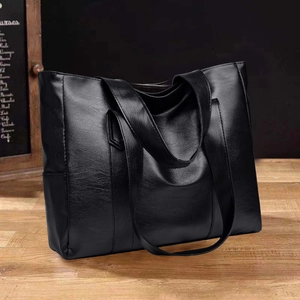 Large black PU leather tote bag with pebble texture and dual shoulder straps for work
