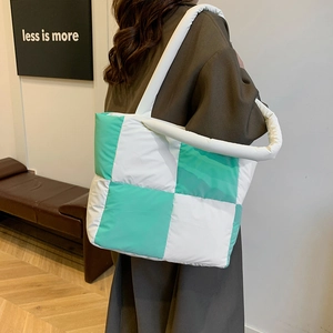 Quilted checkerboard tote bag in mint green and white with thick shoulder straps