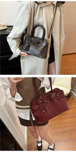 Deep brown and burgundy vintage tote bags showing leather texture and metal buckles