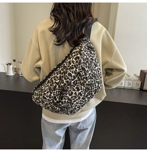 Detail of leopard print chest bag showing durable fabric texture and adjustable strap