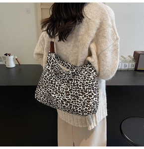 Close-up of the vintage leopard print hobo bag showing its large capacity and soft texture
