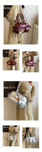 Detail view of stylish retro PU leather bowling bag with multi-pockets and sports charms