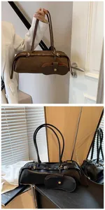 Detail of retro baguette shoulder bag with matching coin pouch and gold-tone hardware