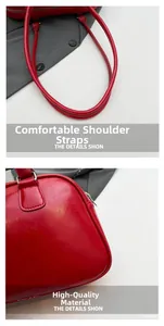 Detail view of red PU leather vintage shoulder bag showing soft texture and round handle