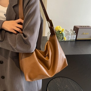 Vintage brown PU leather hobo bag with turtle charm and pebbled texture for women