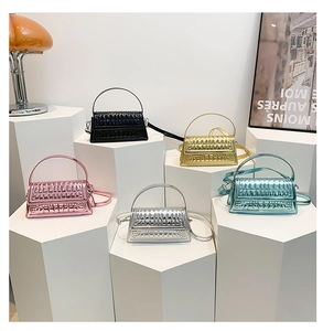 Glossy geometric embossed handbags in metallic black gold silver pink and blue colors